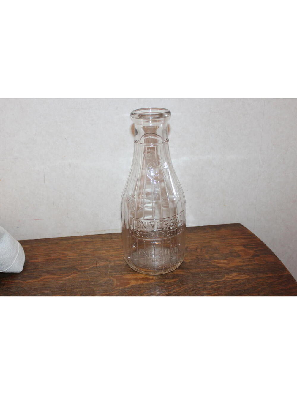 Vintage Universal Store Bottle – One Quart Embossed Glass Milk Bottle